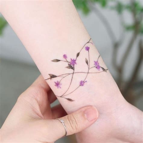 27 Flower Wrist Tattoo Ideas For Bracelet Tattoos Artofit 27 Flower Wrist Tattoo Ideas For Bracelet Tattoos Artofit