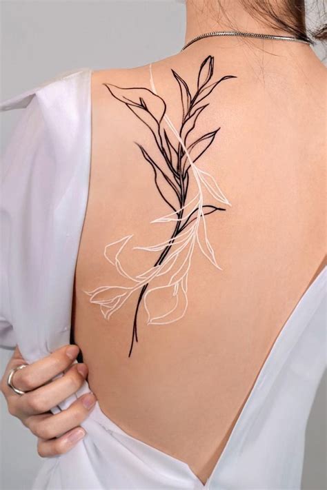 30 Glamorous Back Tattoo Ideas For Women