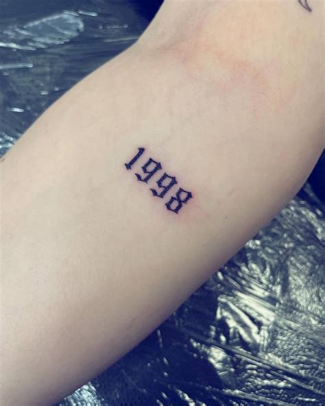 Amp Quot 1998 Amp Quot Lettering Tattoo On The Ankle Amp Quot 1998 Amp Quot Lettering Tattoo On The Ankle