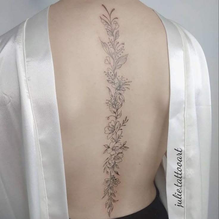 Flower Tattoo On Spine