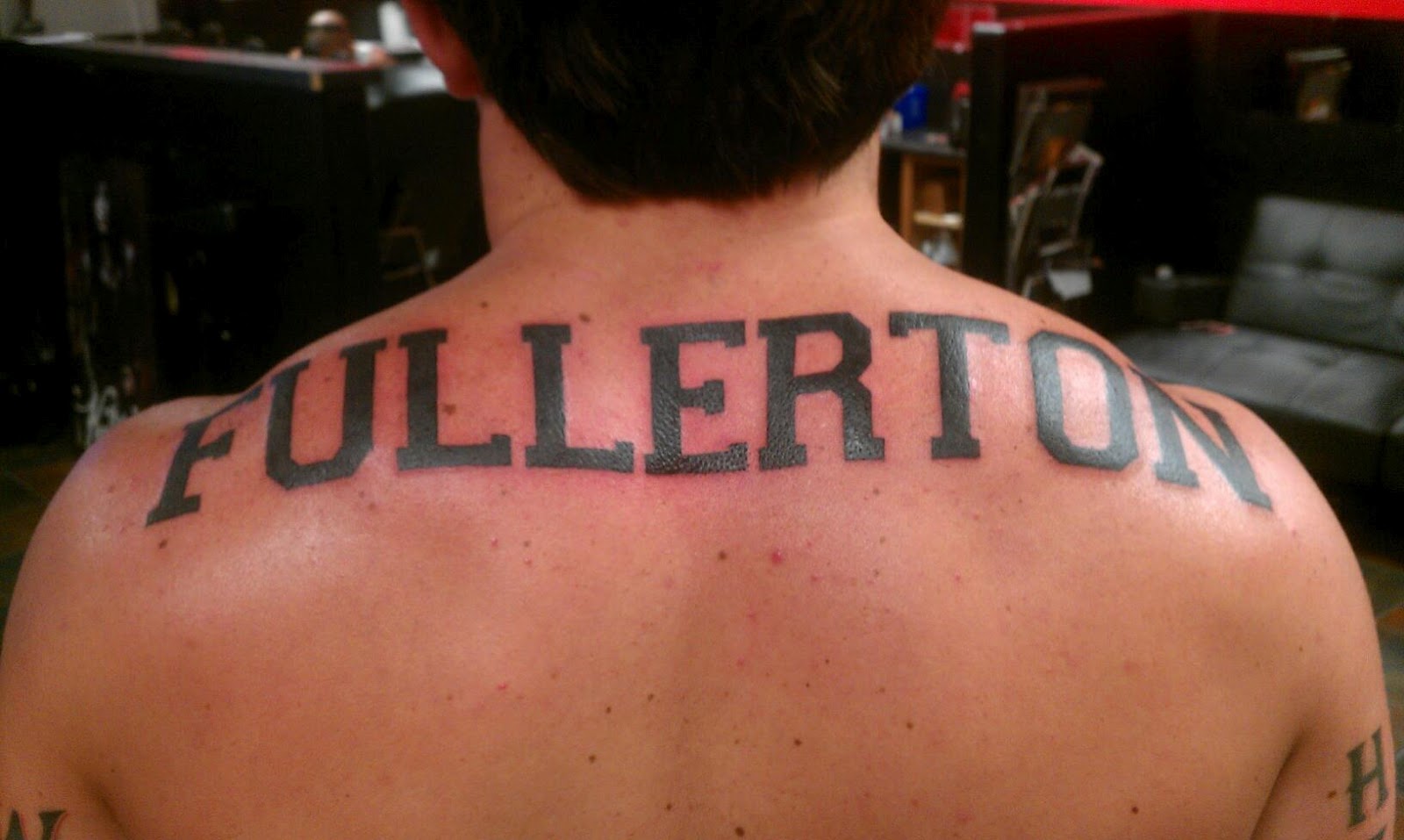 Last Name Back Tattoo