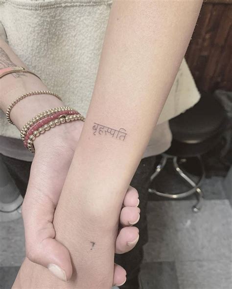Sanskrit Lettering Tattoo Located On The Wrist Sanskrit Lettering Tattoo Located On The Wrist