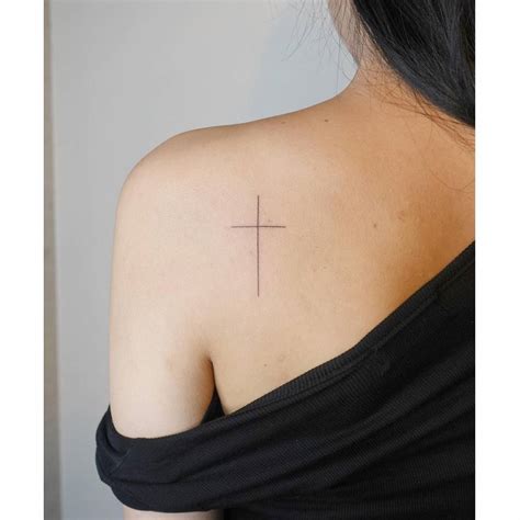 Shoulder Blade Cross Tattoos
