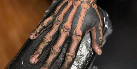 Skeleton Finger Tattoo