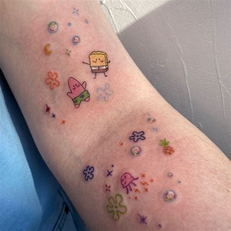 Spongebob Tattoo On The Left Thigh Cartoon Tattoos Funny Tattoos
