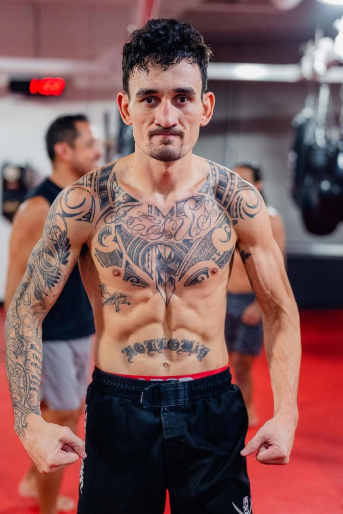 What Does Max Holloway Amp 39 S Tattoo Say